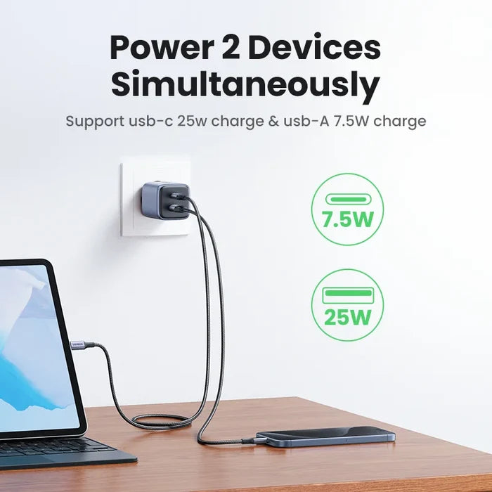 Dual-port USB charger capable of powering two devices simultaneously with different wattages.