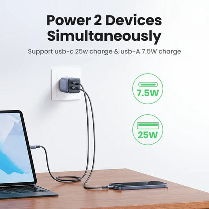 Dual-port USB charger capable of powering two devices simultaneously with different wattages.