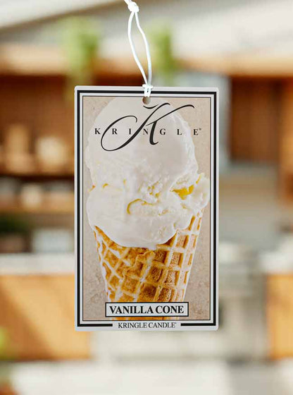 Kringle Candle Vanilla Cone air freshener tag with a blurred background