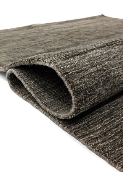 Vloerkleed MOMO Rugs Panorama Uni Dark Brown