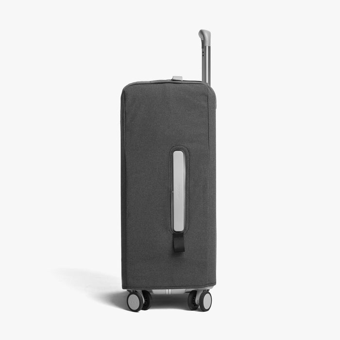 Carry-On | Side view of Carry-On Washable Luggage Cover in grey