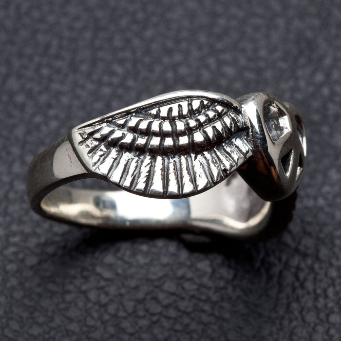 A bohemian-style peace ring, handcrafted from solid .925 sterling silver.